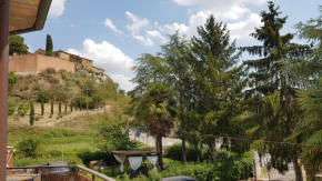 VAL D'ORCIA DELUXE 1 ELEGANTE CASA immersa nel verde con WiFi, giardino e parcheggio